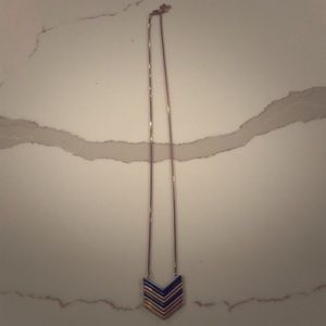 Brushed gold and gunmetal silver necklace.